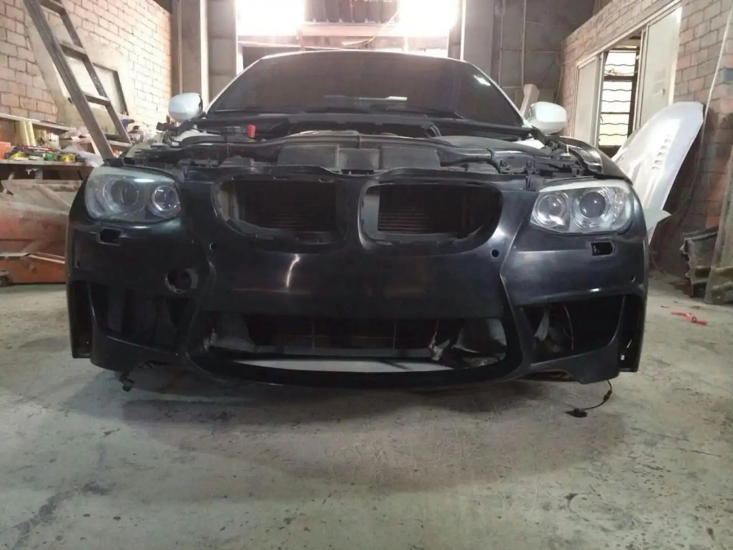 New High Quality 11-16 BMW3 Series E92 1M Glass Fiber Front Bumper Conversion with Excellent Fitment